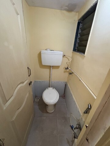 Bathroom in 1 BHK Apartment at New Mhada Tower, Malad West – for Sale