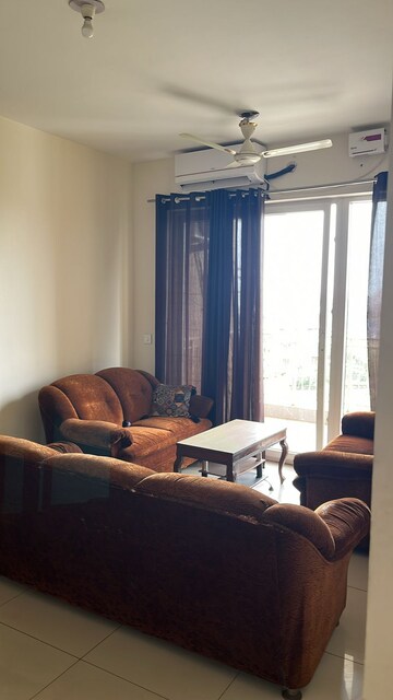 Living Room in 3 BHK Apartment at Emaar Palm Gardens, Sector 83 – for Rent