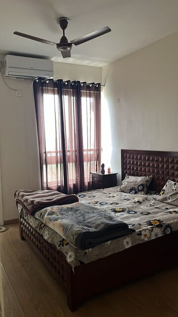 Bedroom in 3 BHK Apartment at Emaar Palm Gardens, Sector 83 – for Rent