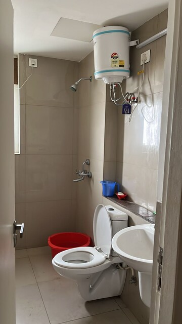 Bathroom in 3 BHK Apartment at Emaar Palm Gardens, Sector 83 – for Rent