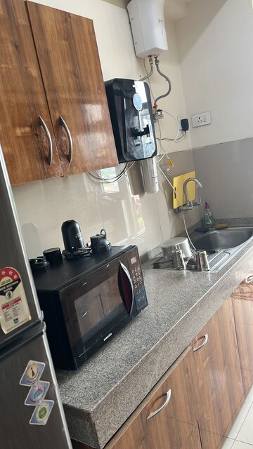 Kitchen in 3 BHK Apartment at Emaar Palm Gardens, Sector 83 – for Rent