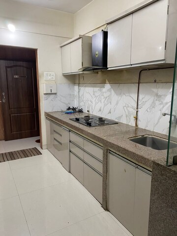 Kitchen in 2 BHK Apartment at Kumar Park Infinia, Fursungi – for Rent