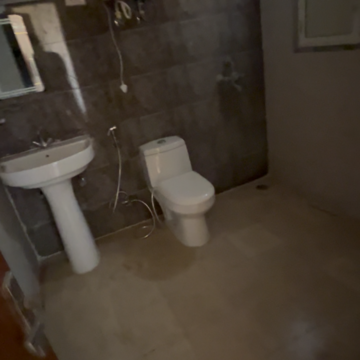 Bathroom in 3 BHK Apartment at Mittal Rajnagar Residency, Vikas Nagar – for Rent
