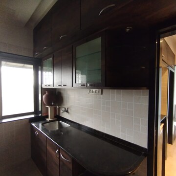 Kitchen in 1 BHK Apartment at Ratnamani Tower, Lokmanya Tilak Colony – for Rent
