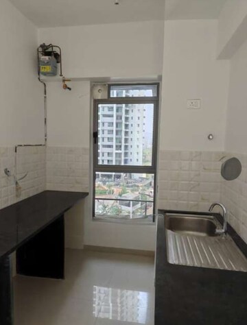 Kitchen in 3 BHK Apartment at Kalpataru Immensa, Kolshet Road – for Rent