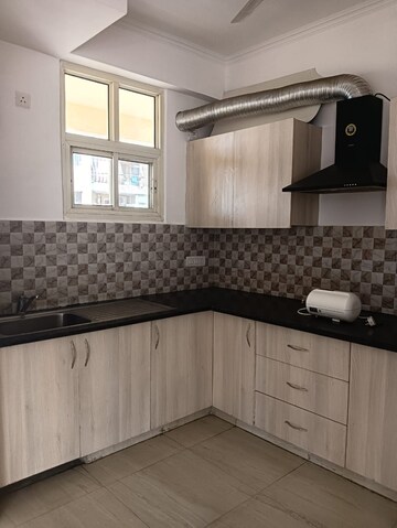 Kitchen in 2.5 BHK Builder Floor at Orchid Island, Sector 51 – for Sale