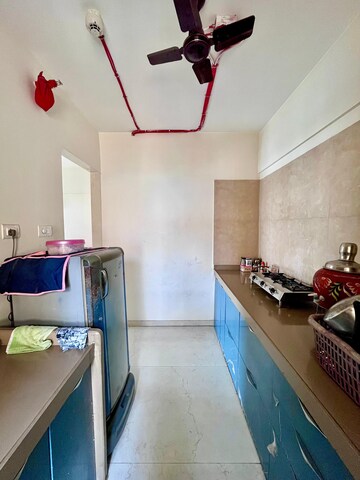 Kitchen in 2 BHK Apartment at Dosti West County Phase 4 Dosti Pine, Balkum Pada – for Sale