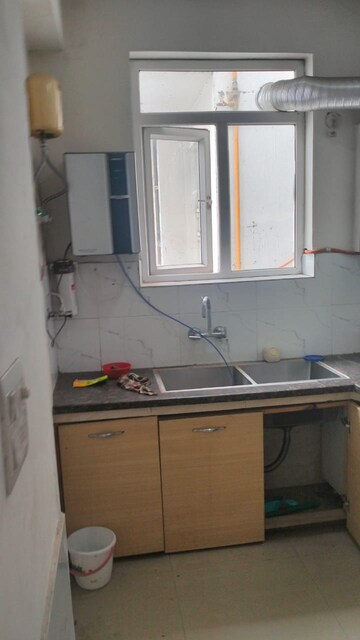 Kitchen in 2 BHK Apartment at NK Sharma Savitry Greens, Lohgarh – for Rent