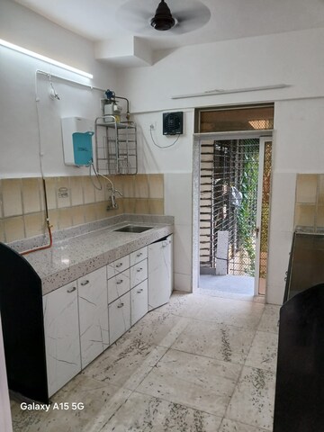 Kitchen in 1 BHK Apartment at Daya Sagar CHSL, Goregaon East – for Rent