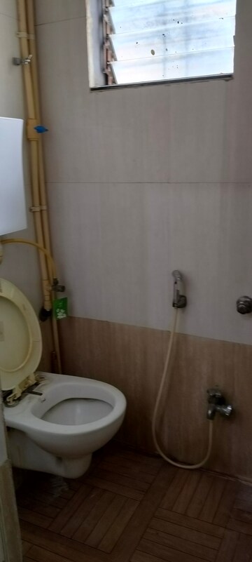 Bathroom in 1 BHK Apartment at Suryodaya Apartments, Seawoods Sector 48 – for Rent