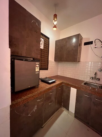 Kitchen in 2 BHK Builder Floor at Freedom Fighters Enclave – for Rent