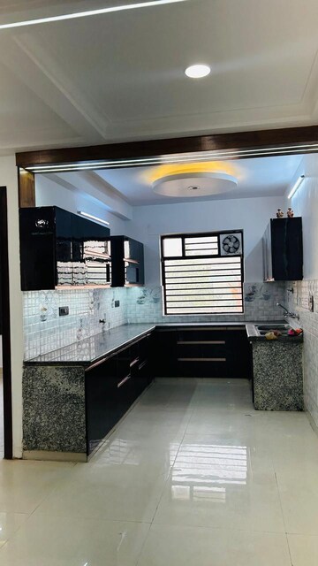 Kitchen in 4 BHK Builder Floor at Srishti Greenfield Homes, Green Fields Colony – for Rent