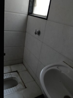 Bathroom in 2 BHK Apartment at Pisoli – for Sale
