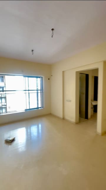 Living Room in 1 BHK Apartment at Lodha Casa Essenza, Dahisar East – for Sale