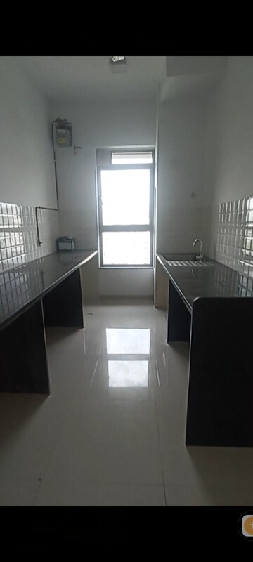 Kitchen in 2 BHK Apartment at Kalpataru Immensa, Kolshet Road – for Rent