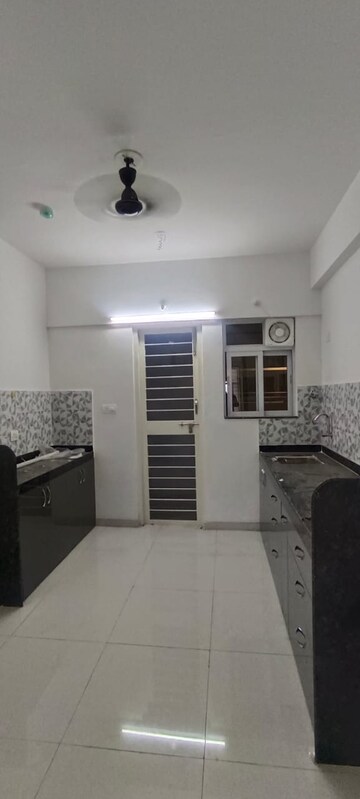 Kitchen in 2 BHK Apartment at Navi Peth – for Sale