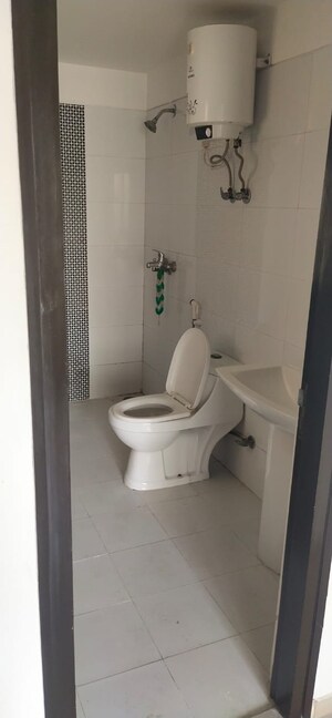 Bathroom in 3 BHK Apartment at Gulshan Vivante, Sector 137 – for Sale