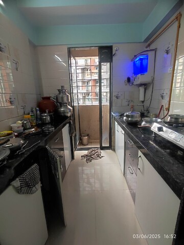 Kitchen in 2 BHK Apartment at Agarwal Lifestyle, Virar West – for Rent