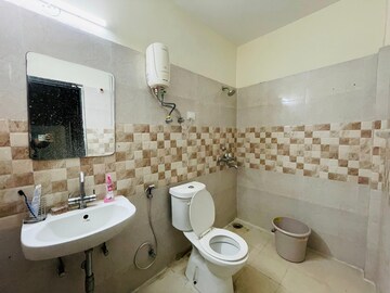 Bathroom in 3 BHK Apartment at Gaur Sportswood, Sector 79 – for Rent