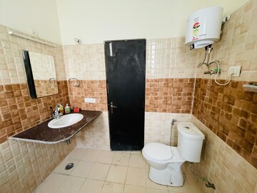 Bathroom in 3 BHK Apartment at Gaur Sportswood, Sector 79 – for Rent