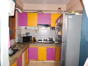Kitchen in 2 BHK Apartment at Viddhi Tower, Mahagunpuram – for Sale