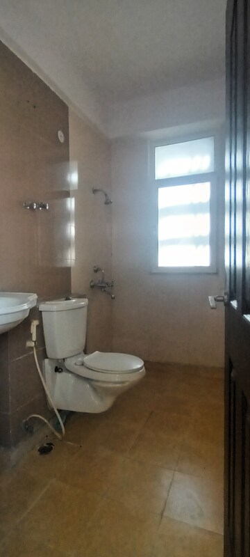 Bathroom in 3 BHK Apartment at Ramprastha Pearl Court, Vaishali Sector 7 – for Sale