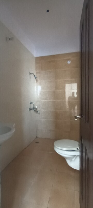 Bathroom in 3 BHK Apartment at Ramprastha Pearl Court, Vaishali Sector 7 – for Sale