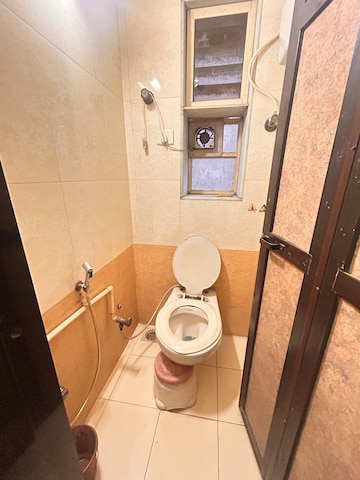 Bathroom in 1.5 BHK Apartment at Jay Prakash Nagar CHS, Vidyavihar East – for Rent