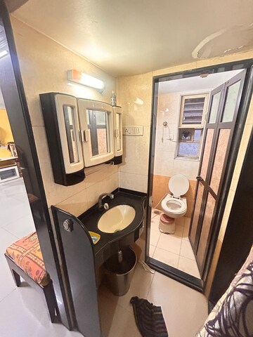 Bathroom in 1.5 BHK Apartment at Jay Prakash Nagar CHS, Vidyavihar East – for Rent