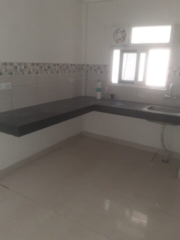 Kitchen in 2 BHK Apartment at Signature Global Orchard Avenue, Sector 93 – for Rent