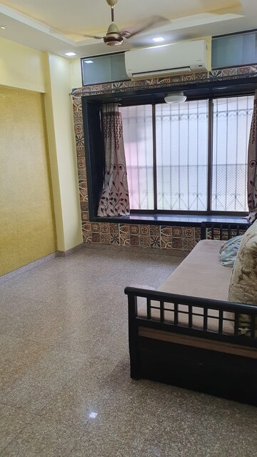 Living Room in 1 BHK Apartment at Vrindavan CHS Malad, Malad East – for Rent