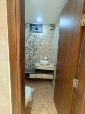 Bathroom in 4 BHK Builder Floor at Malibu Shopping Arcade, Sector 47 – for Sale