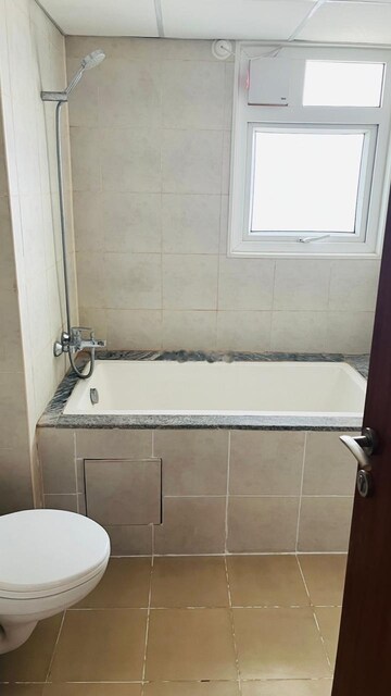 Bathroom in 3 BHK Apartment at LnT Raintree Boulevard, Hebbal – for Rent