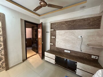 Living Room in 1 BHK Apartment at Cosmos Jewels, Ghodbunder Road – for Rent