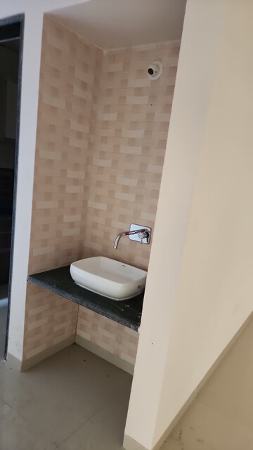 Bathroom in 2 BHK Apartment at Shree Tirupati STG Signature Residency, Patlipada – for Rent