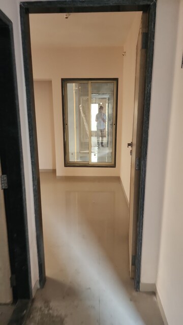 Building Lobby in 2 BHK Apartment at Shree Tirupati STG Signature Residency, Patlipada – for Rent