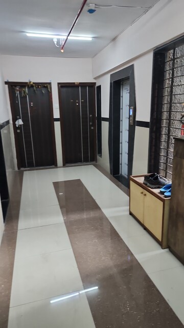 Living Room in 2 BHK Apartment at Shree Tirupati STG Signature Residency, Patlipada – for Rent