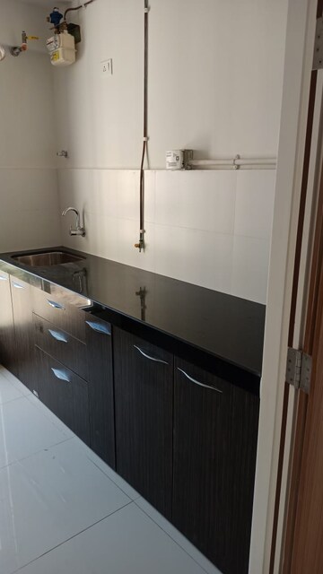 Kitchen in 1.5 BHK Apartment at Bhayandarpada – for Rent