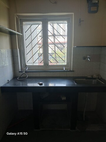 Kitchen in 1 BHK Apartment at Raheja Township, Malad East – for Rent