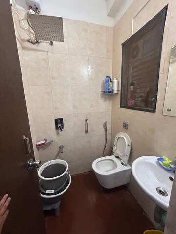 Bathroom in 2 BHK Apartment at Ruparel Iris, Matunga West – for Rent