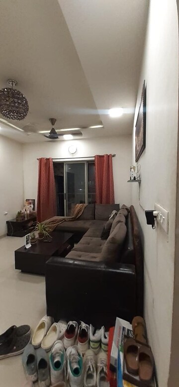 Living Room in 1 BHK Apartment at Casa RioGold, Dombivli East – for Rent