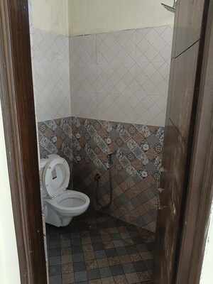 Bathroom in 3 BHK Builder Floor at Guru Nanak Enclave, Dhakoli – for Sale
