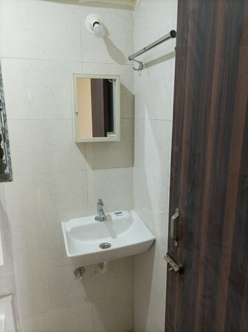 Bathroom in 1 BHK Apartment at Dharti Presidio, Malad West – for Rent