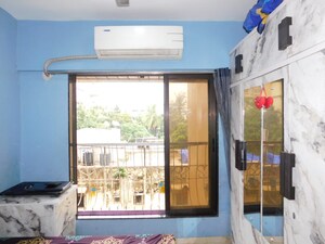 Bedroom in 3 BHK Apartment at Geeta Bhavan Andheri, Andheri East – for Sale