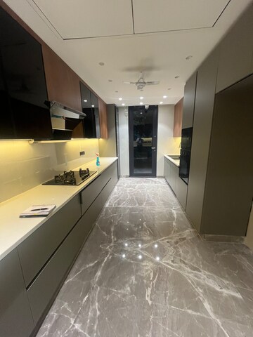Kitchen in 4 BHK Builder Floor at Sushant Lok I – for Sale