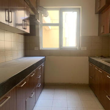 Kitchen in 3 BHK Apartment at Piedmont Taksila Heights, Sector 37c – for Rent