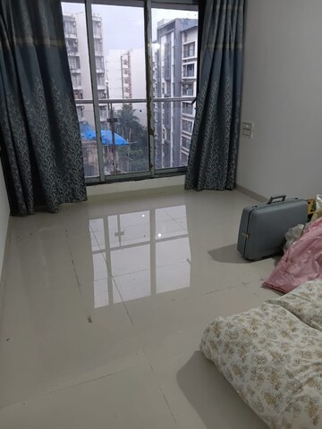 Living Room in 2 BHK Apartment at Galaxy Pinnacle, Vile Parle East – for Rent