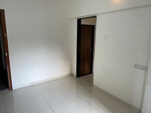 Room in 1 BHK Apartment at Kandivali West – for Sale