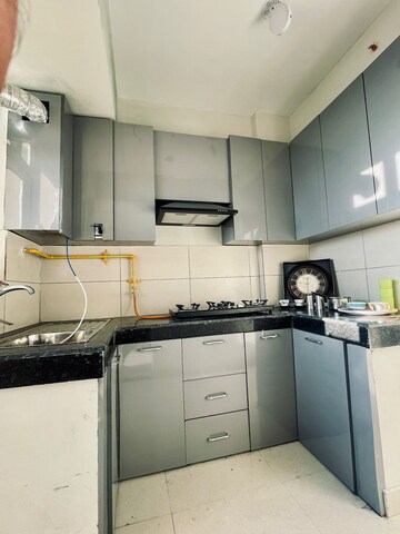 Kitchen in 2 BHK Apartment at Tata Eureka Park, Sector 150 – for Rent