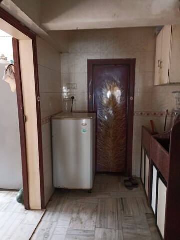 Kitchen in 2 BHK Apartment at Paradise Tower Naupada, Naupada – for Rent